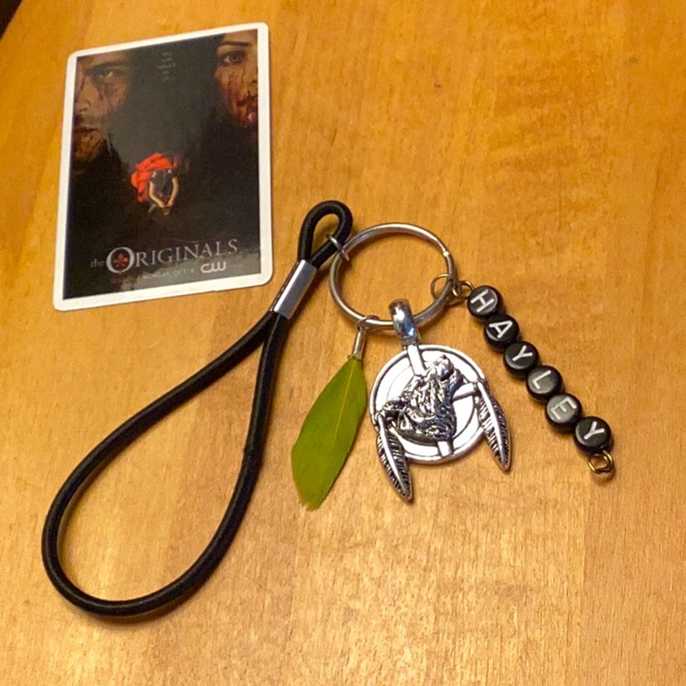Hayley wolf 🐺 charm keychain elastic band small green feather 🪶letter bead fun